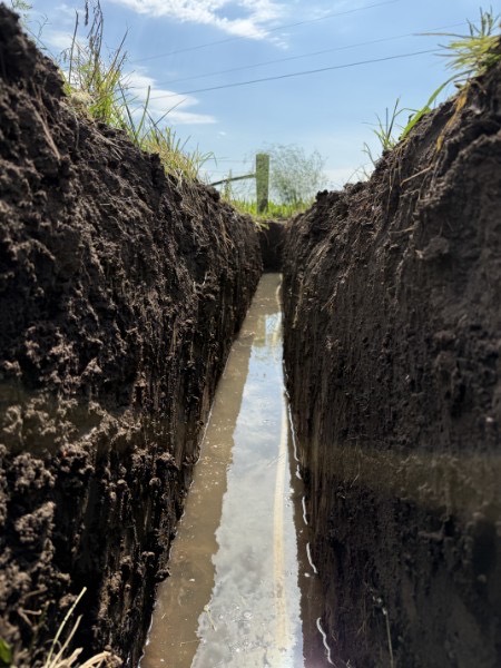 Deep sewer trench excavation by Hometown Flow Plumbing in Richards, Missouri Deep sewer trench excavation by Hometown Flow Plumbing in Richards, Missouri