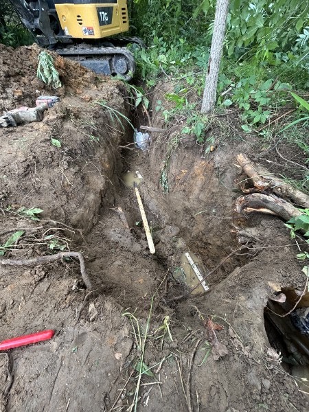 Sewer line excavation with mini excavator for a plumbing contractor in Richards, MO Sewer line excavation with mini excavator for a plumbing contractor in Richards, MO